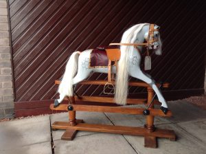 Roslin horse restored in all its glory, accessories are real horse hair on mane and tail, real leather saddle and saddle cloth and real brass stirrups with irons.